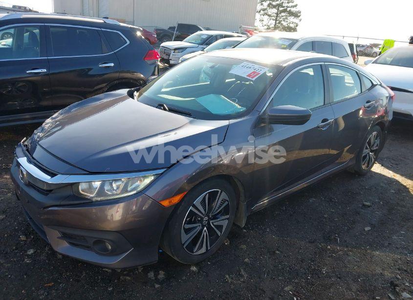 Photo 2 of 2017 Honda Civic EX-T (VIN 19XFC1F35HE021213)