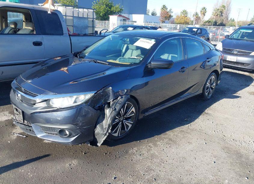 Photo 2 of 2017 Honda Civic EX-T (VIN 19XFC1F35HE214199)