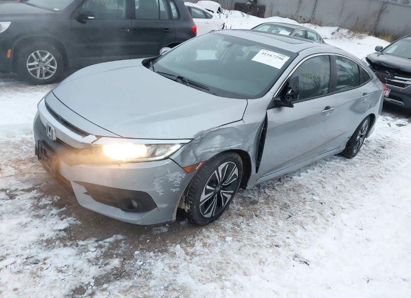 Photo 2 of 2017 Honda Civic EX-T (VIN 19XFC1F36HE004999)
