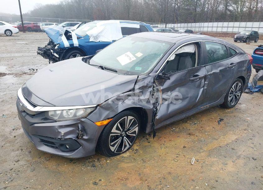 Photo 2 of 2017 Honda Civic EX-T (VIN 19XFC1F36HE006283)