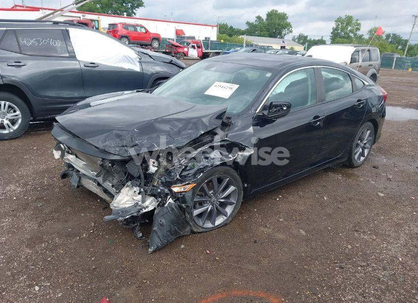 Photo 2 of 2019 Honda Civic EX (VIN 19XFC1F36KE002399)