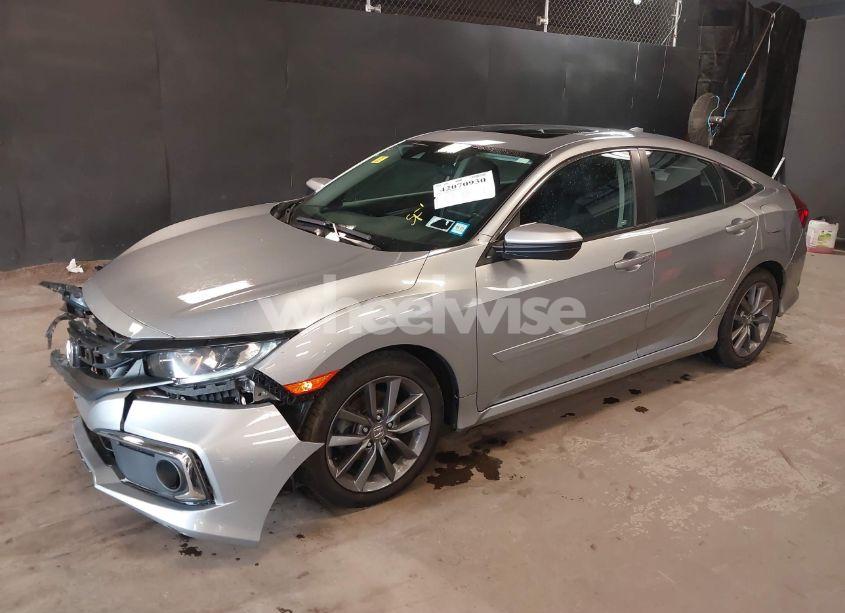 Photo 2 of 2019 Honda Civic EX (VIN 19XFC1F36KE210878)