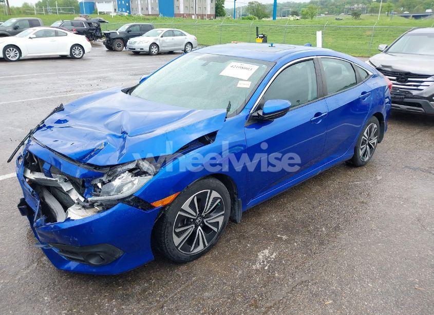 Photo 2 of 2017 Honda Civic EX-T (VIN 19XFC1F37HE032035)