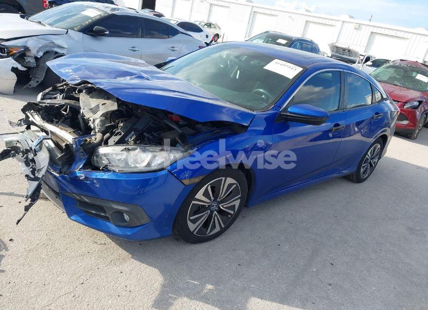 Photo 2 of 2017 Honda Civic EX-T (VIN 19XFC1F38HE013476)