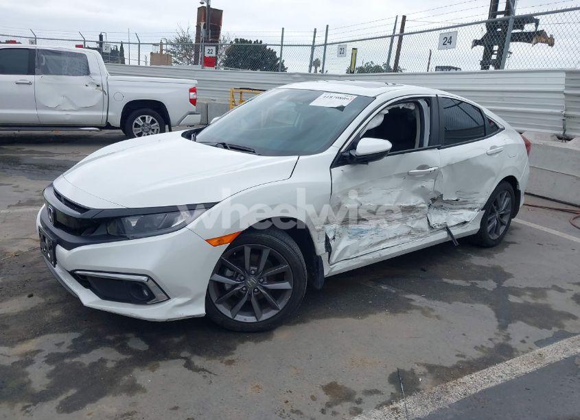 Photo 2 of 2019 Honda Civic EX (VIN 19XFC1F38KE210039)
