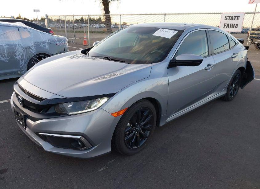 Photo 2 of 2019 Honda Civic EX (VIN 19XFC1F38KE216407)