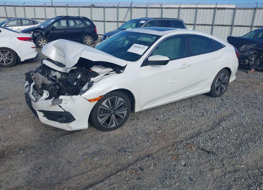 Photo 2 of 2016 Honda Civic EX-T (VIN 19XFC1F39GE042807)