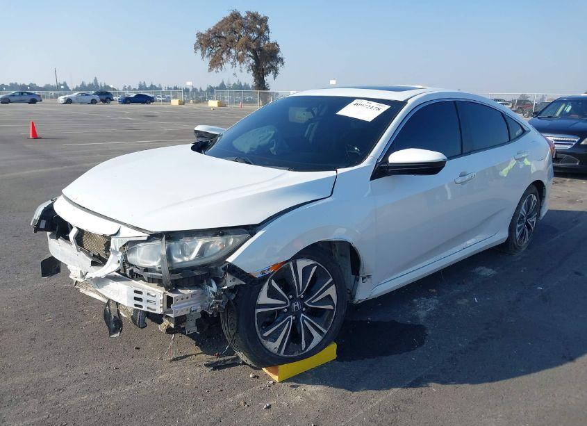 Photo 2 of 2018 Honda Civic EX-T (VIN 19XFC1F39JE201865)