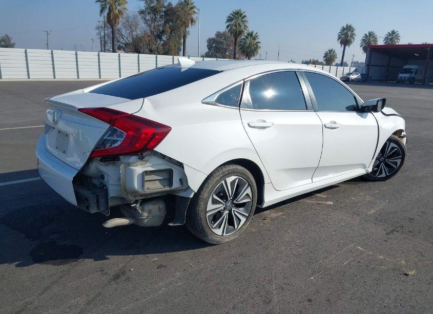 Photo 4 of 2018 Honda Civic EX-T (VIN 19XFC1F39JE201865)