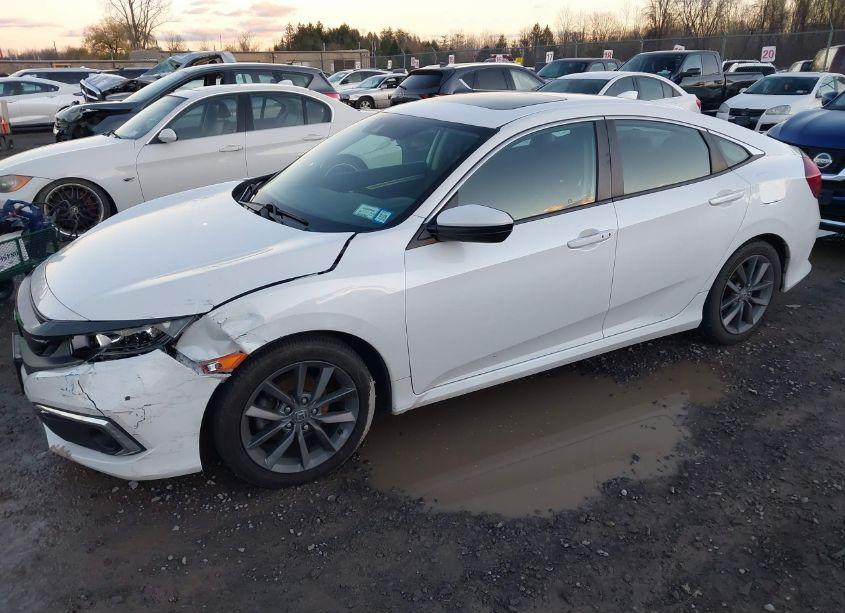 Photo 2 of 2019 Honda Civic EX (VIN 19XFC1F39KE203519)