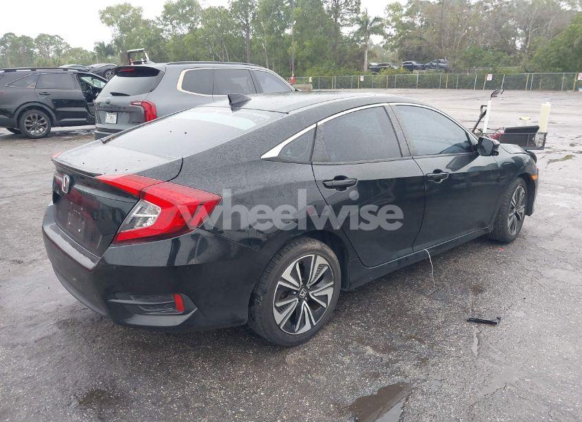 Photo 4 of 2016 Honda Civic EX-L (VIN 19XFC1F70GE034999)