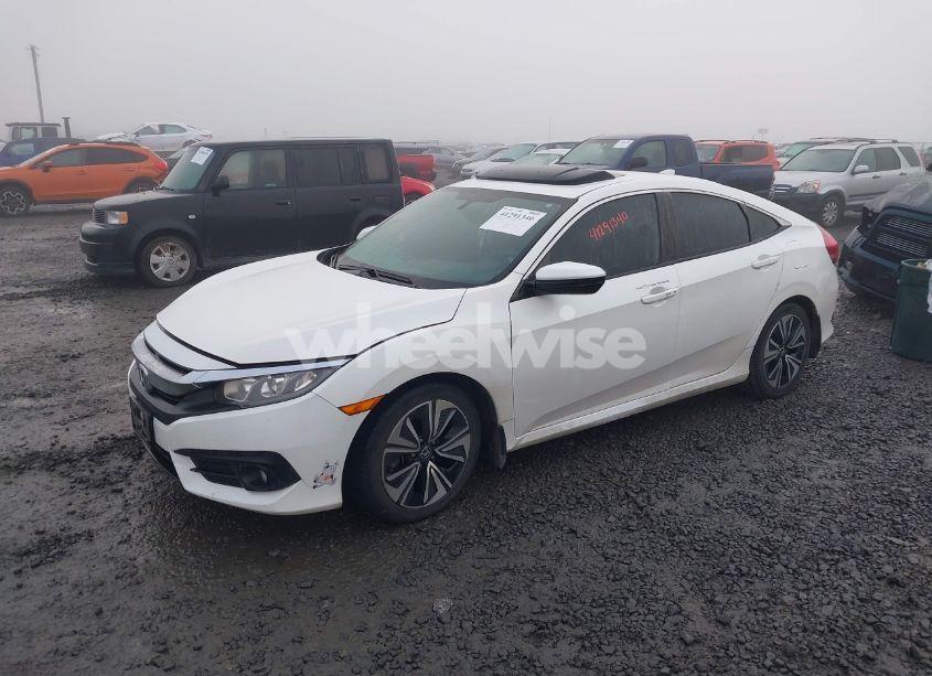 Photo 2 of 2016 Honda Civic EX-L (VIN 19XFC1F70GE215438)