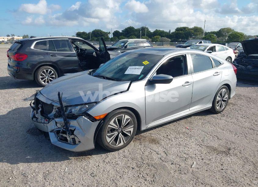 Photo 2 of 2017 Honda Civic EX-L (VIN 19XFC1F70HE012986)