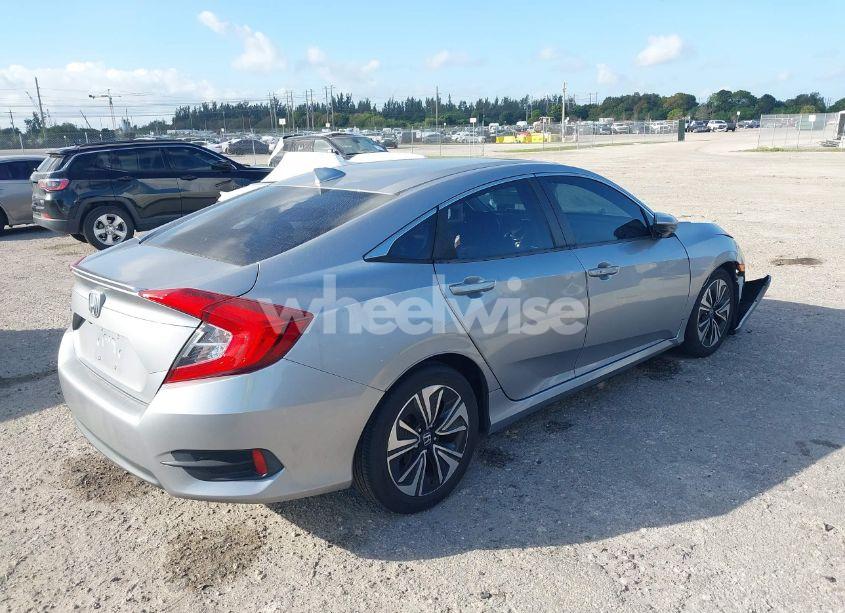 Photo 4 of 2017 Honda Civic EX-L (VIN 19XFC1F70HE012986)