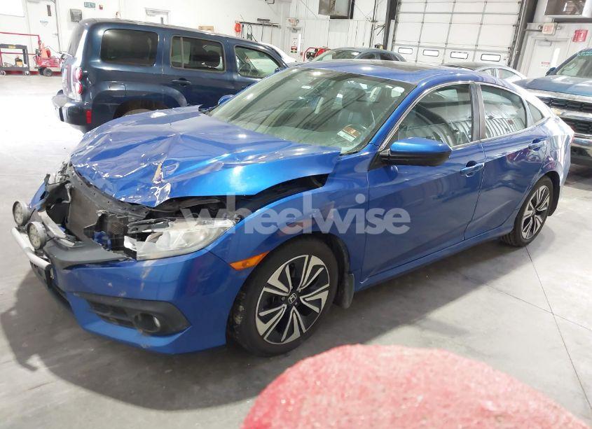 Photo 2 of 2017 Honda Civic EX-L (VIN 19XFC1F71HE010874)