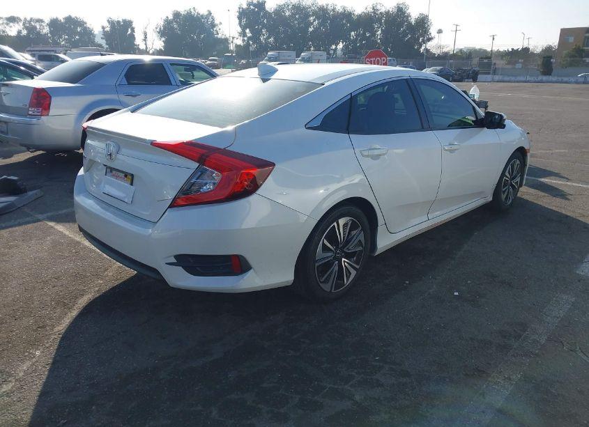 Photo 4 of 2016 Honda Civic EX-L (VIN 19XFC1F72GE204022)