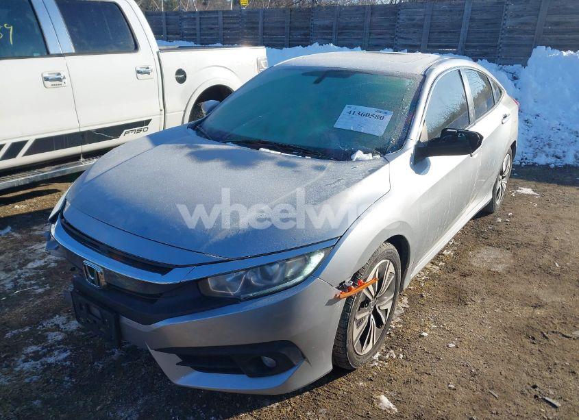 Photo 2 of 2017 Honda Civic EX-L (VIN 19XFC1F73HE205410)