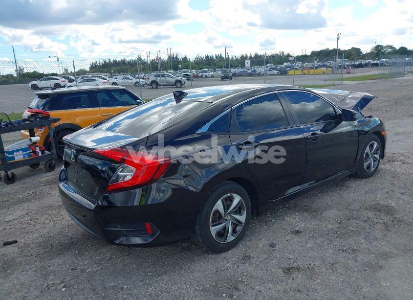 Photo 4 of 2018 Honda Civic EX-L (VIN 19XFC1F74JE003908)