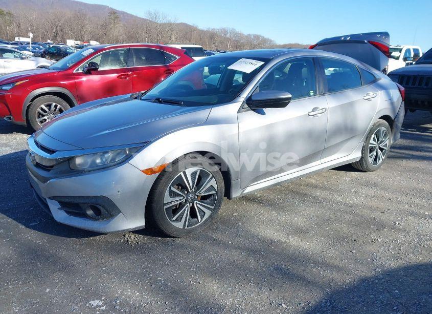 Photo 2 of 2016 Honda Civic EX-L (VIN 19XFC1F75GE010939)