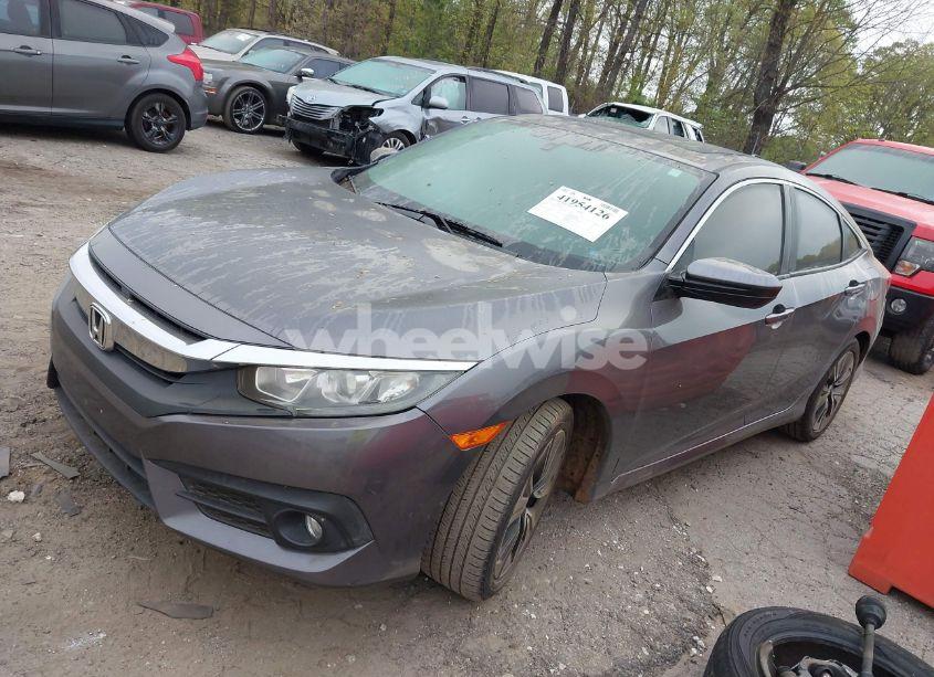 Photo 2 of 2017 Honda Civic EX-L (VIN 19XFC1F75HE200211)