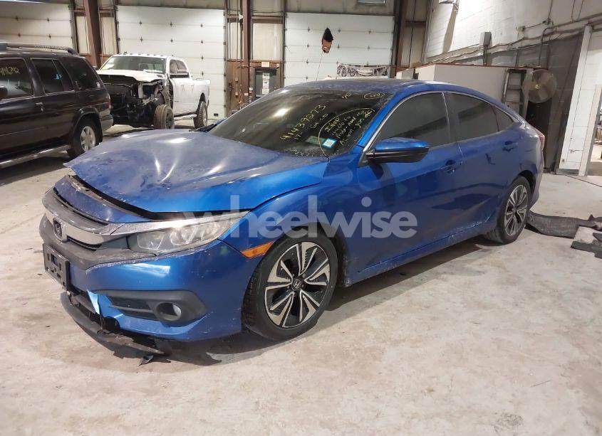 Photo 2 of 2017 Honda Civic EX-L (VIN 19XFC1F75HE204095)