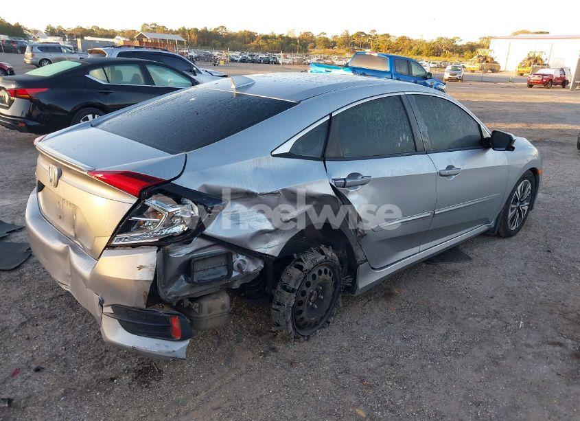 Photo 4 of 2016 Honda Civic EX-L (VIN 19XFC1F76GE020136)