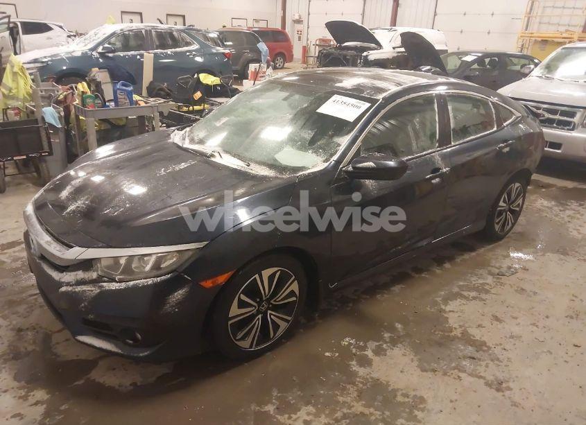 Photo 2 of 2017 Honda Civic EX-L (VIN 19XFC1F77HE017764)