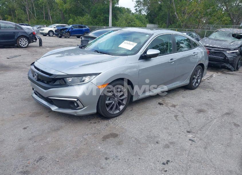 Photo 2 of 2021 Honda Civic EX-L (VIN 19XFC1F77ME008461)