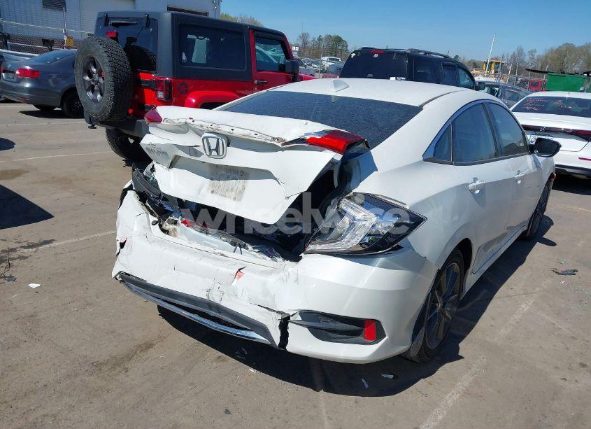 Photo 4 of 2019 Honda Civic EX-L (VIN 19XFC1F79KE001976)