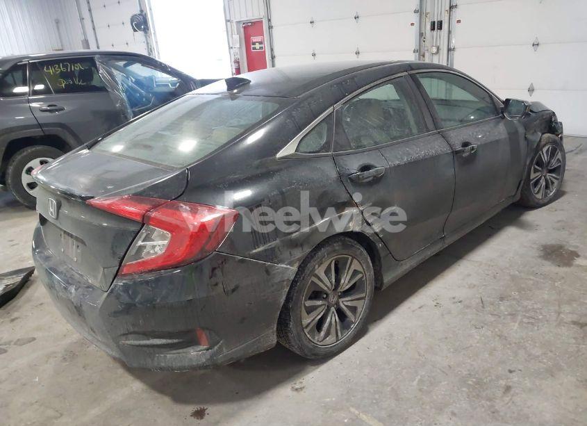 Photo 4 of 2016 Honda Civic EX-L (VIN 19XFC1F7XGE007499)
