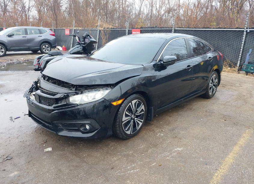 Photo 2 of 2017 Honda Civic EX-L (VIN 19XFC1F7XHE001378)
