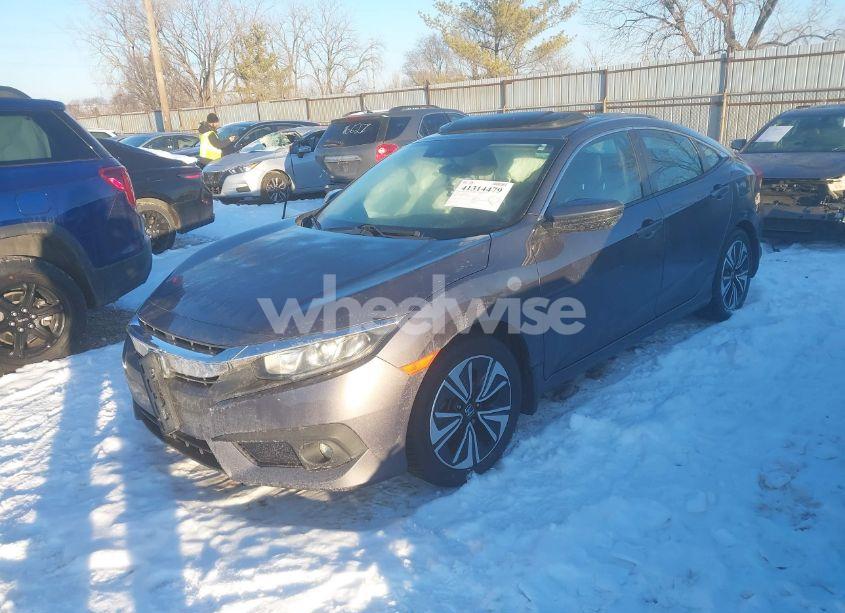 Photo 2 of 2016 Honda Civic EX-L (VIN 19XFC1F84GE000766)