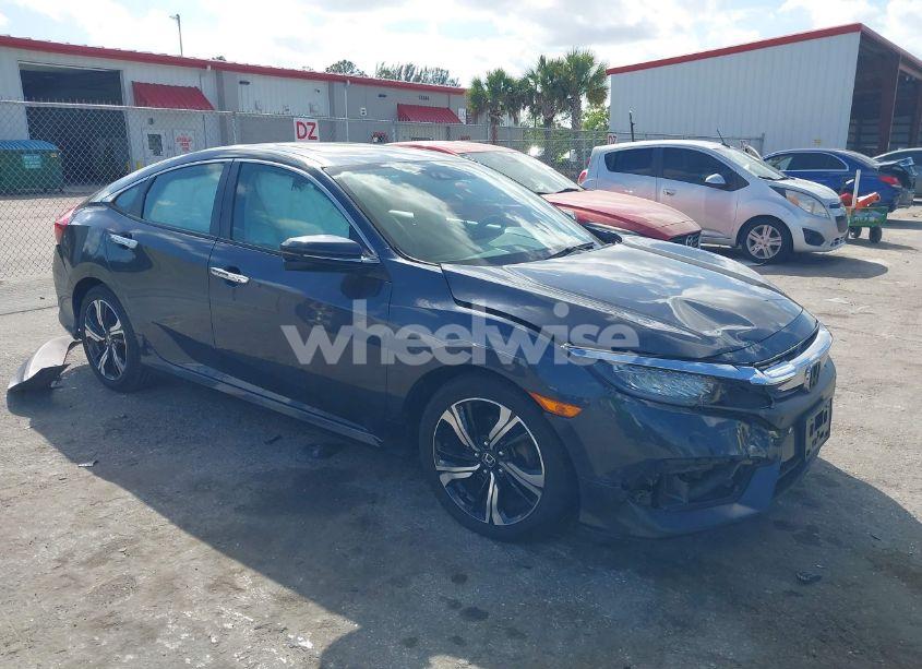 2016 Honda Civic TOURING (VIN 19XFC1F90GE219720) main photo