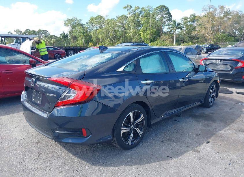 Photo 4 of 2016 Honda Civic TOURING (VIN 19XFC1F90GE219720)