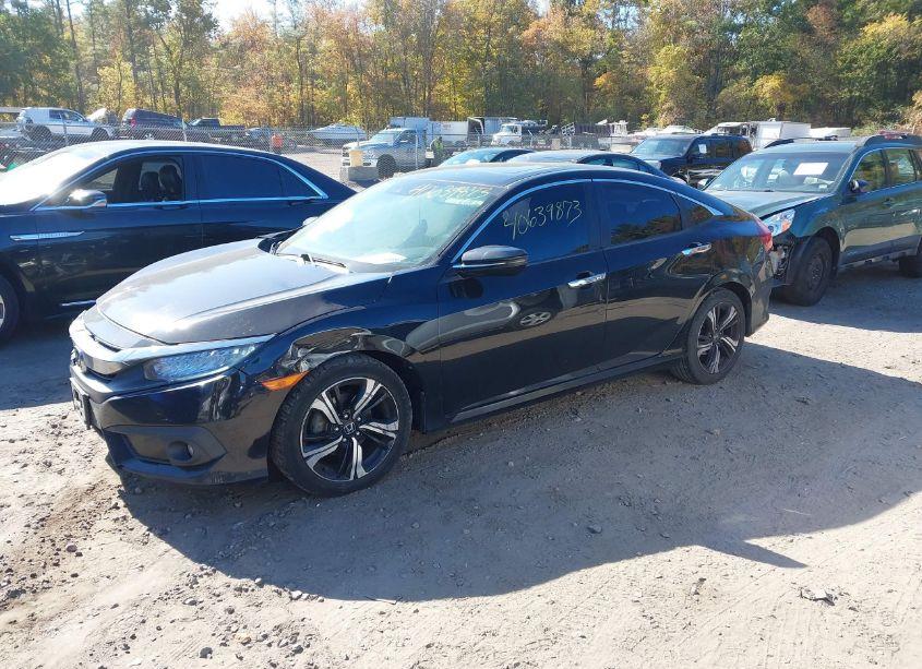Photo 2 of 2017 Honda Civic TOURING (VIN 19XFC1F90HE202496)