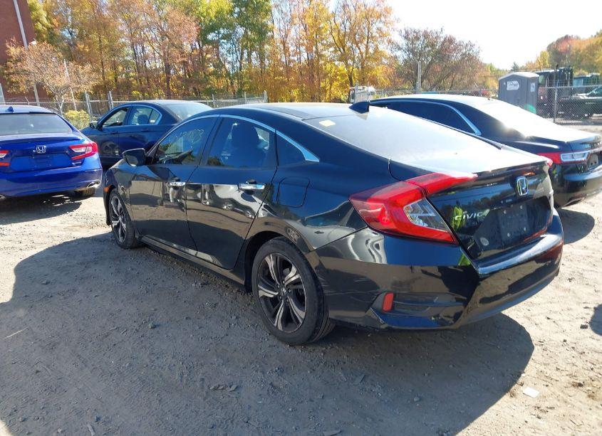 Photo 3 of 2017 Honda Civic TOURING (VIN 19XFC1F90HE202496)