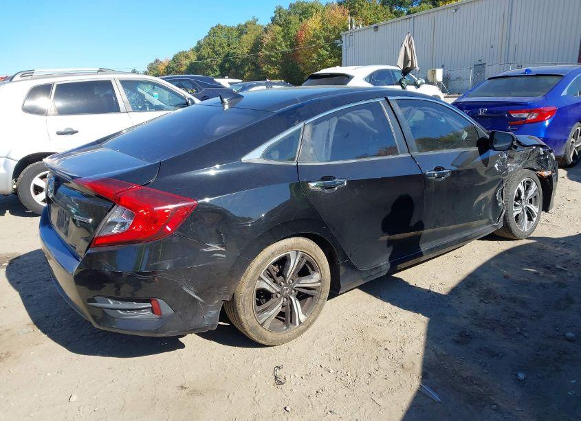 Photo 4 of 2017 Honda Civic TOURING (VIN 19XFC1F90HE202496)