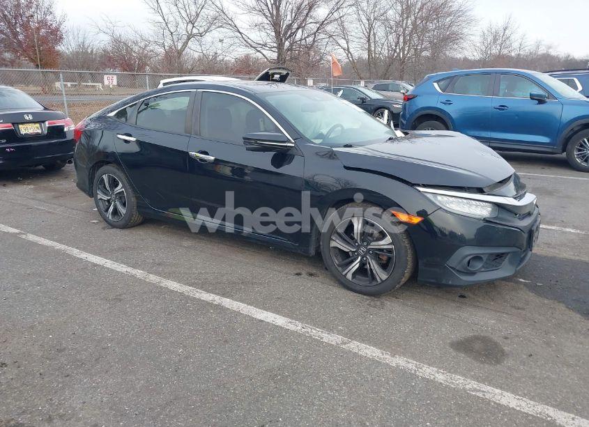 2017 Honda Civic TOURING (VIN 19XFC1F90HE210792) main photo