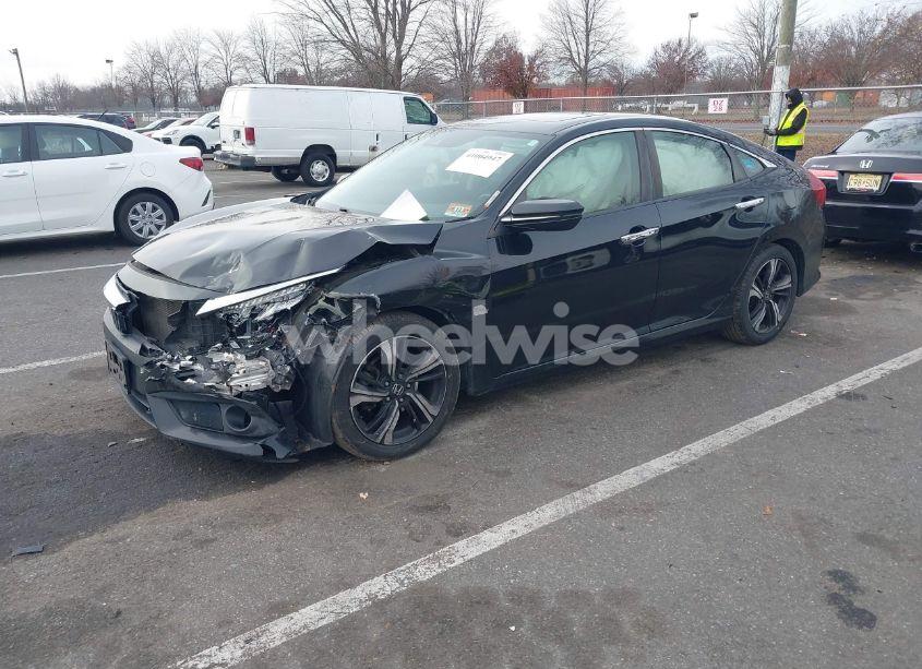 Photo 2 of 2017 Honda Civic TOURING (VIN 19XFC1F90HE210792)