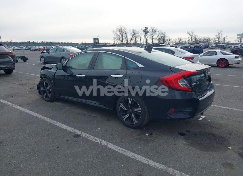 Photo 3 of 2017 Honda Civic TOURING (VIN 19XFC1F90HE210792)