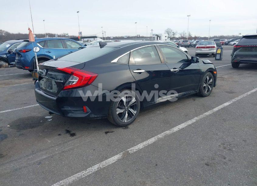 Photo 4 of 2017 Honda Civic TOURING (VIN 19XFC1F90HE210792)