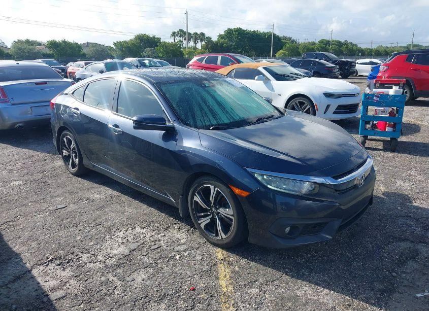 2016 Honda Civic TOURING (VIN 19XFC1F91GE040277) main photo