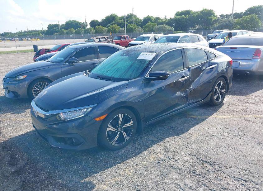 Photo 2 of 2016 Honda Civic TOURING (VIN 19XFC1F91GE040277)
