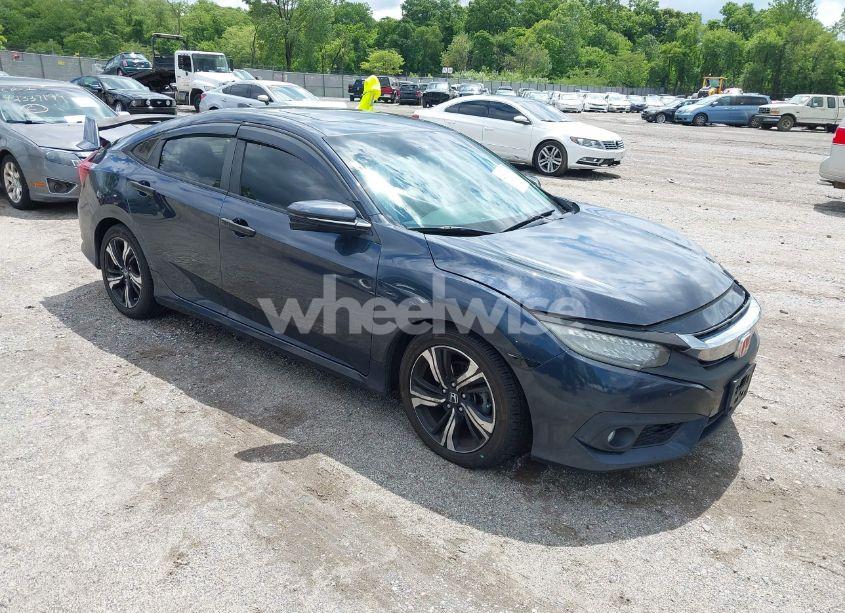 2016 Honda Civic TOURING (VIN 19XFC1F91GE214221) main photo