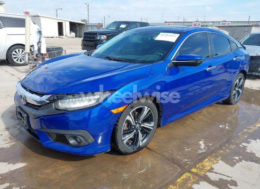 Photo 2 of 2017 Honda Civic TOURING (VIN 19XFC1F91HE013730)
