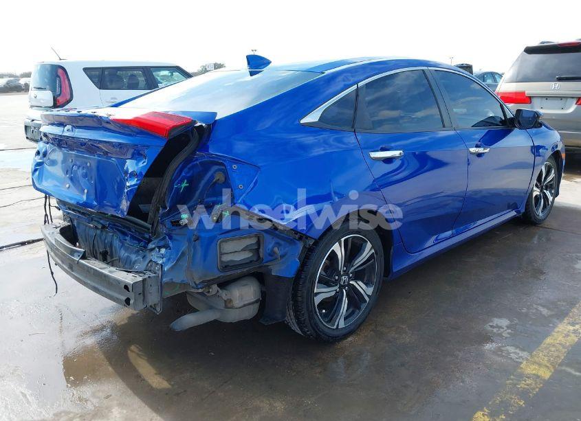 Photo 4 of 2017 Honda Civic TOURING (VIN 19XFC1F91HE013730)