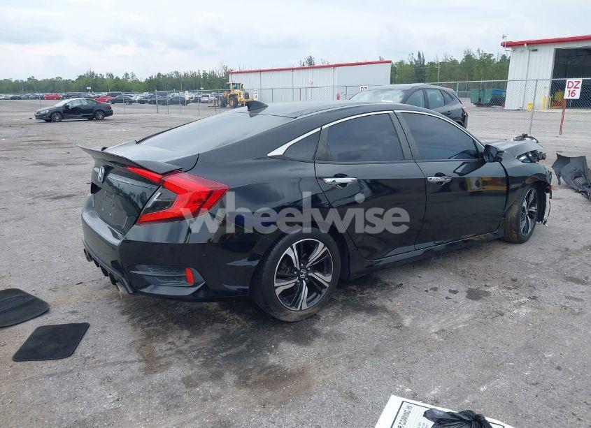 Photo 4 of 2016 Honda Civic TOURING (VIN 19XFC1F92GE007692)