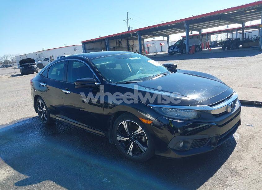 2016 Honda Civic TOURING (VIN 19XFC1F92GE027425) main photo