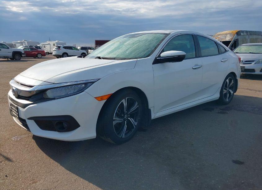 Photo 2 of 2017 Honda Civic TOURING (VIN 19XFC1F92HE013834)