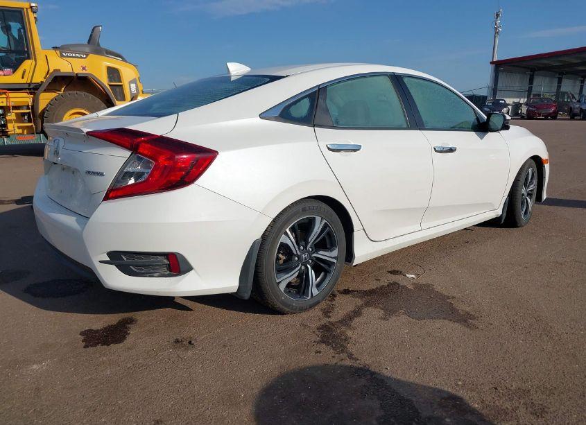 Photo 4 of 2017 Honda Civic TOURING (VIN 19XFC1F92HE013834)